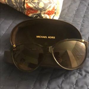 Michael Kor’s brow sunglasses